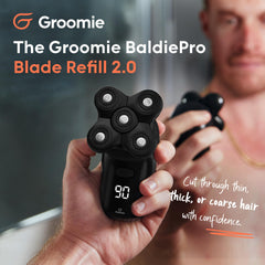 Groomie BaldiePro blade refill 2.0 shown being removed for quick maintenance.