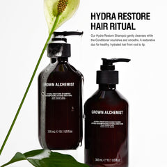 Grown Alchemist Hydra-Restore Shampoo lather close-up highlights refreshing, sulfate-free cleanse.