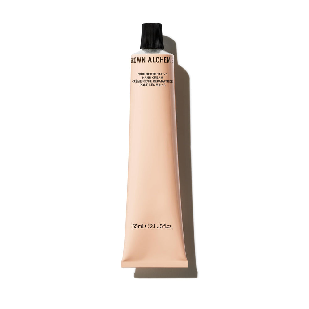 Grown Alchemist Rich Restorative Hand Cream jar shows silky texture for quick absorption.