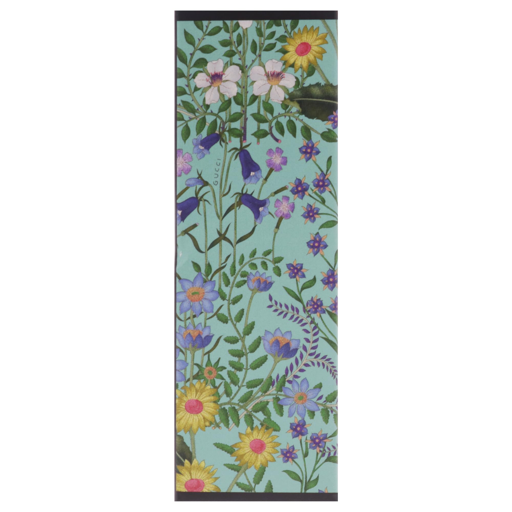 Gucci Flora Gorgeous Jasmine bottle-on-surface styled shot showing versatile wear.