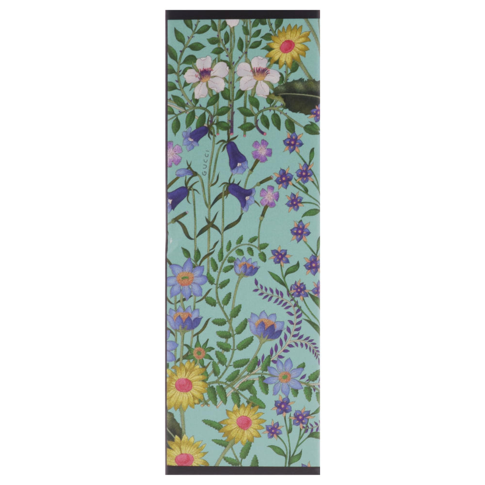 Gucci Flora Gorgeous Jasmine bottle-on-surface styled shot showing versatile wear.