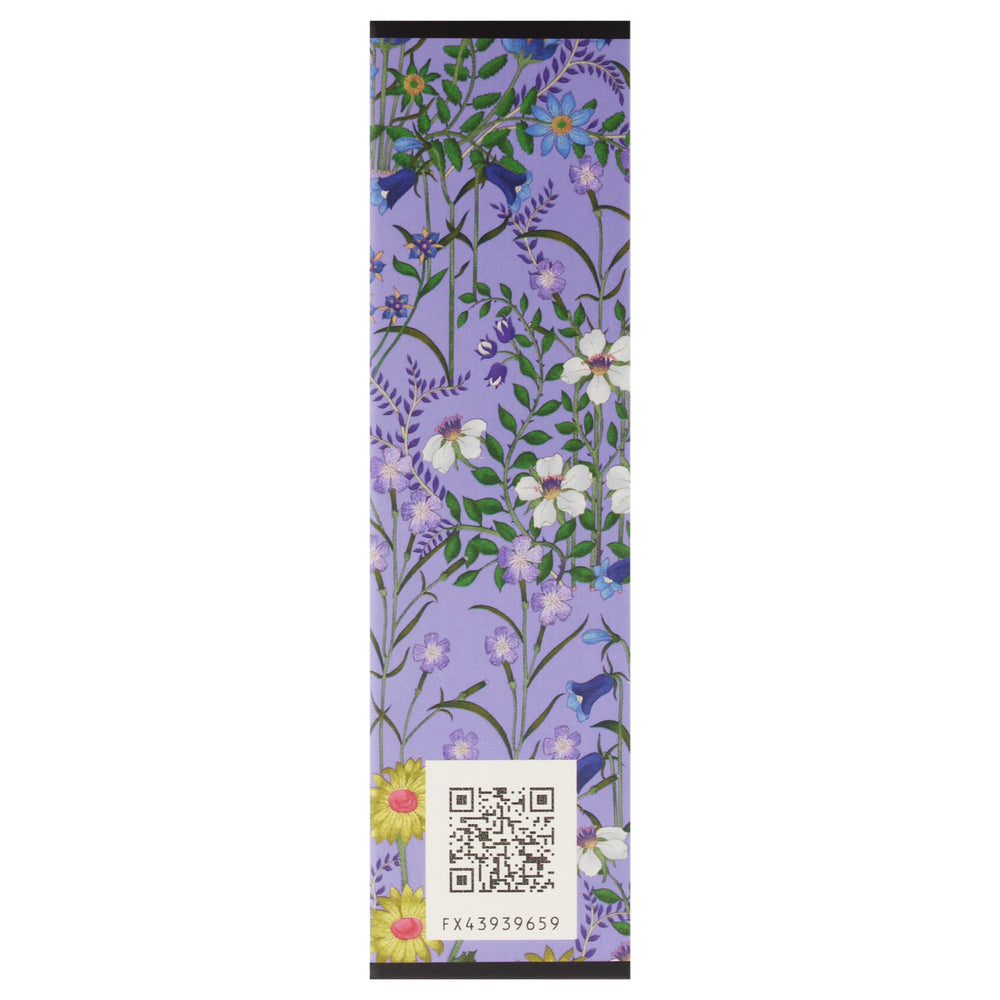 Gucci Flora Gorgeous Magnolia floral arrangement evokes garden-inspired mood.