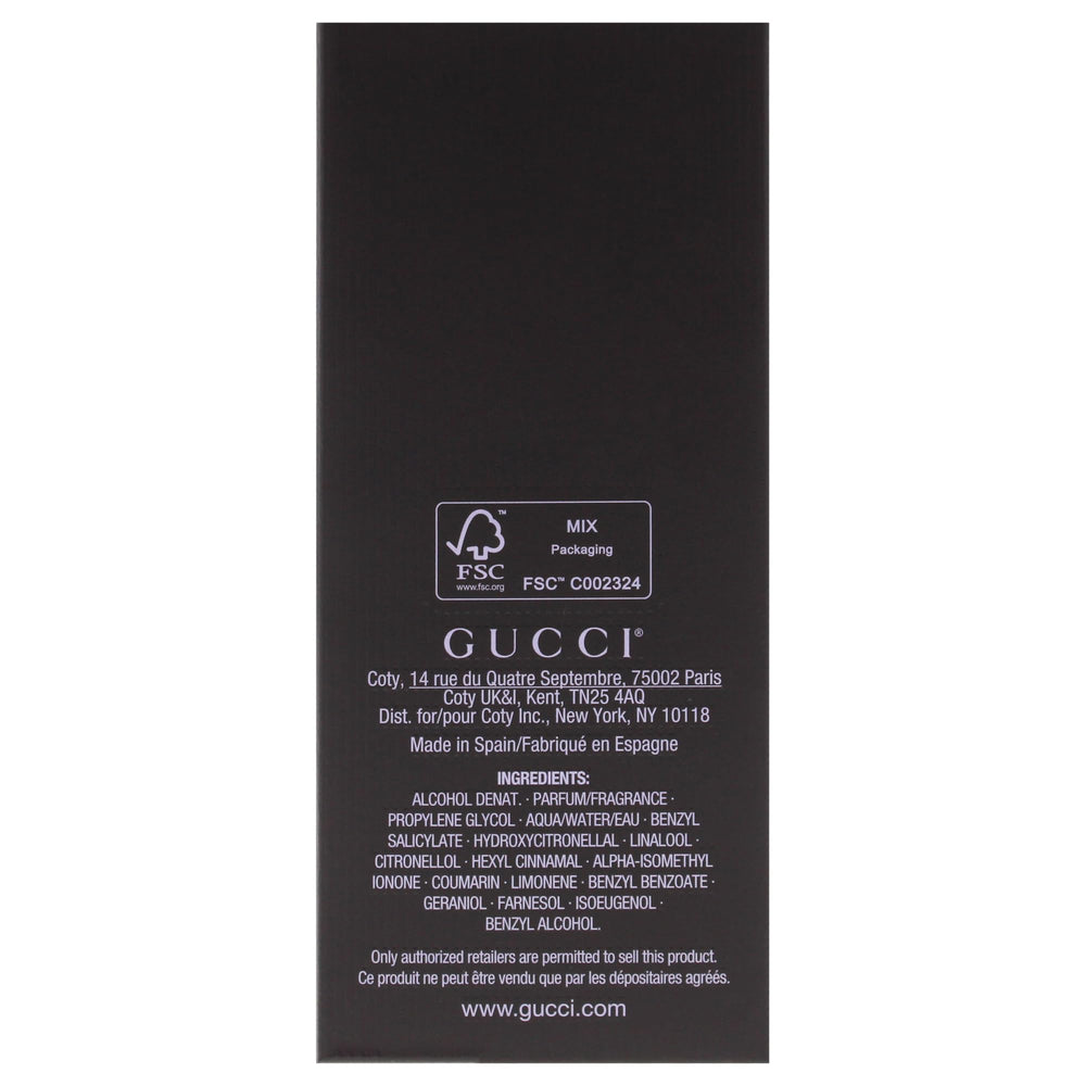 Gucci Flora Gorgeous Magnolia bottle near evening jewelry hints at occasions.