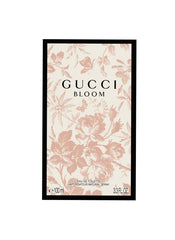 Gucci Gucci Bloom EDT Spray closeup highlights jasmine and tuberose for mood moments.