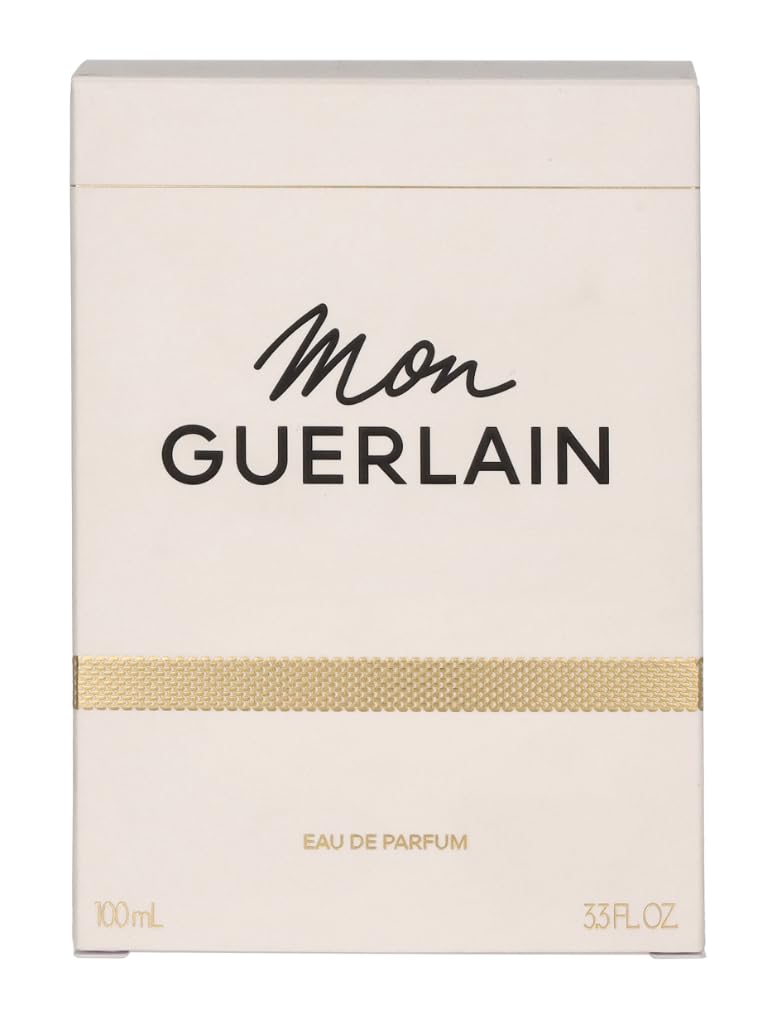 Guerlain Mon Guerlain spray nozzle in action evoking lasting scent through the day