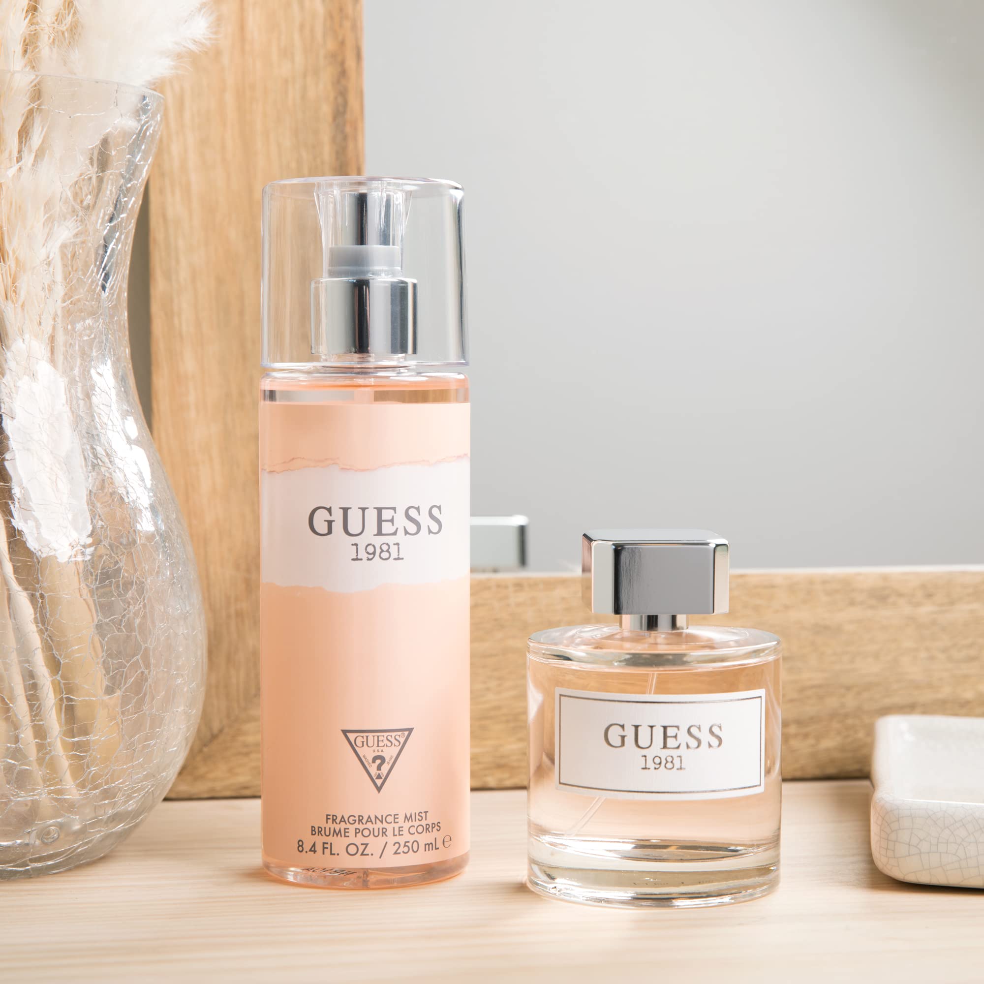 Guess 1981 jasmine petals detail evokes fresh floral lift for spring days.