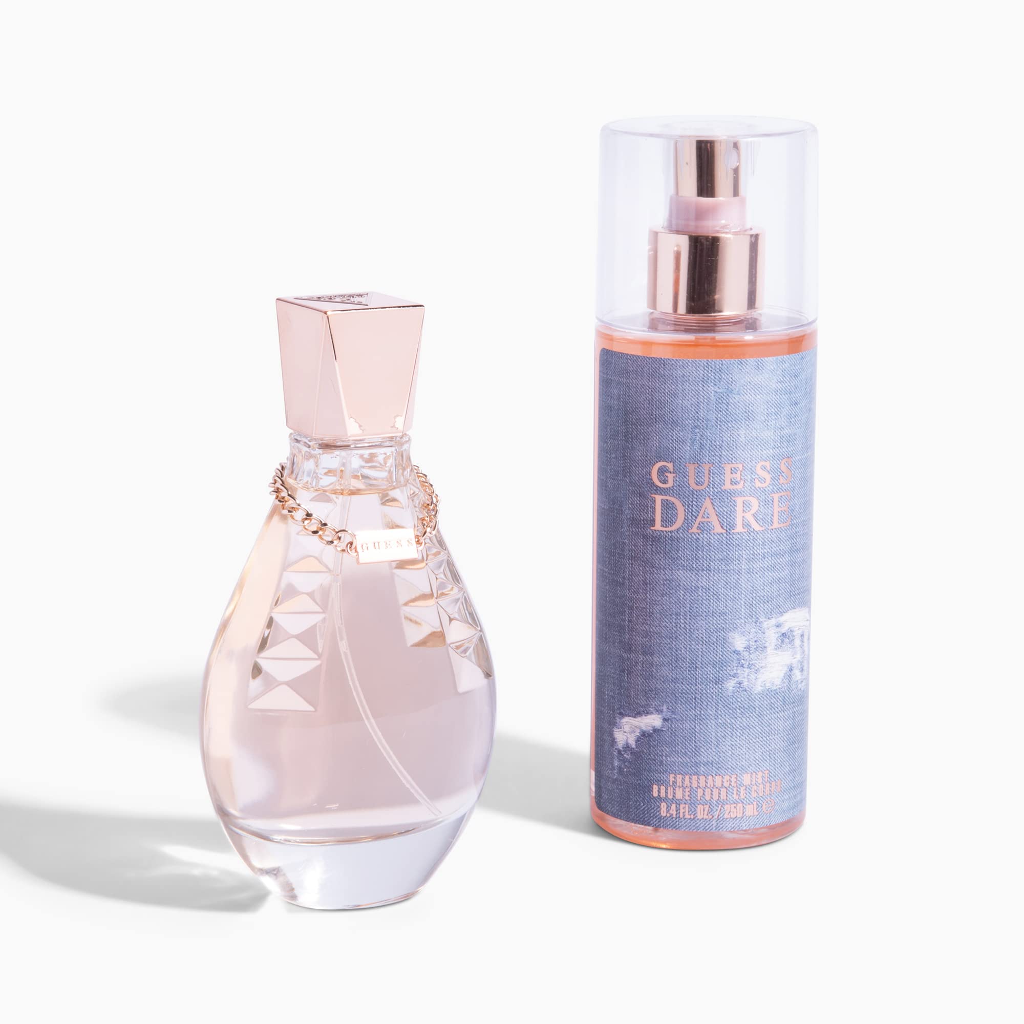 GUESS Dare cap-closeup emphasizes precise spray for lasting fragrance.
