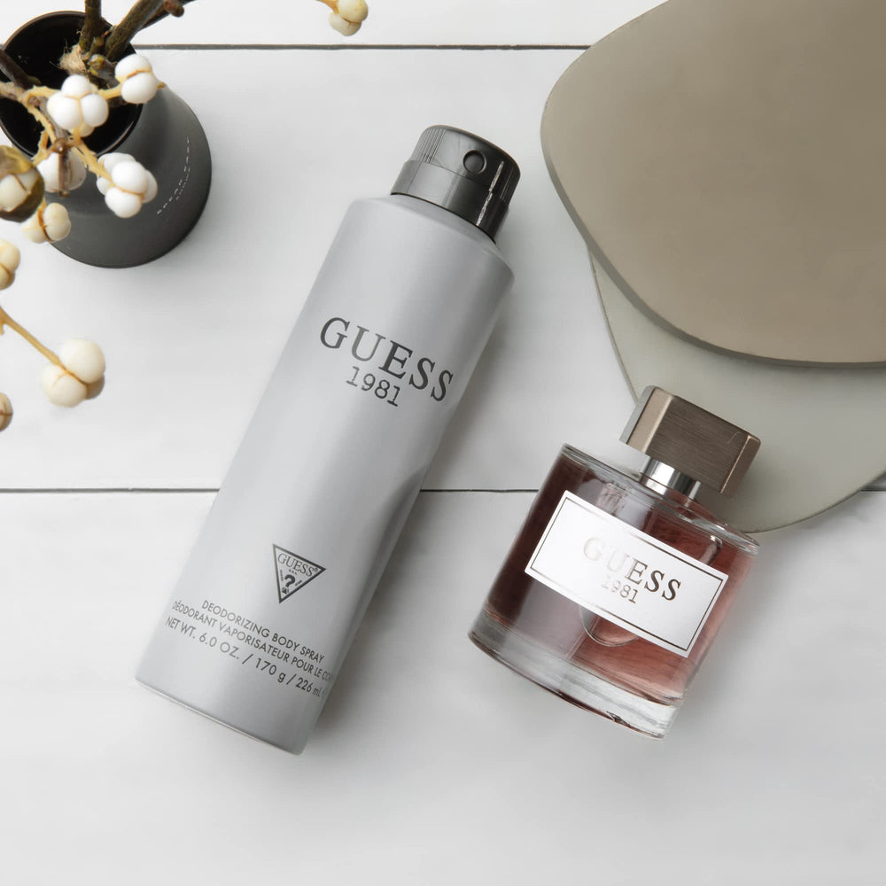 GUESS 1981 woodsy cedarwood and grey amber notes enhance evening allure.