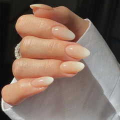 GUFUGU medium almond nails closeup shows natural fit and glossy finish.