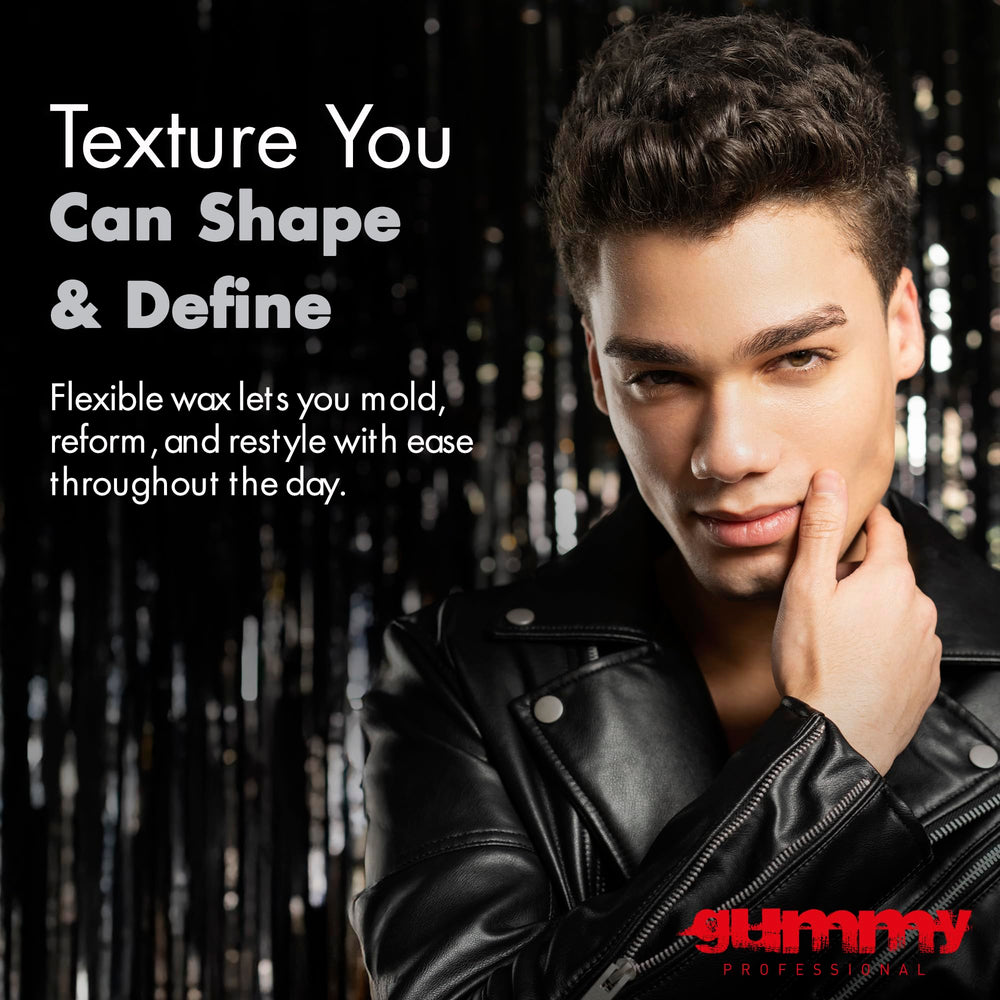 Gummy men styling product in use suggests easy application and controlled finish.