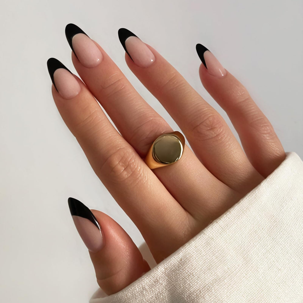 Hadutrek Black French Tip Nails closeup with glossy gel finish for salon-like manicure.