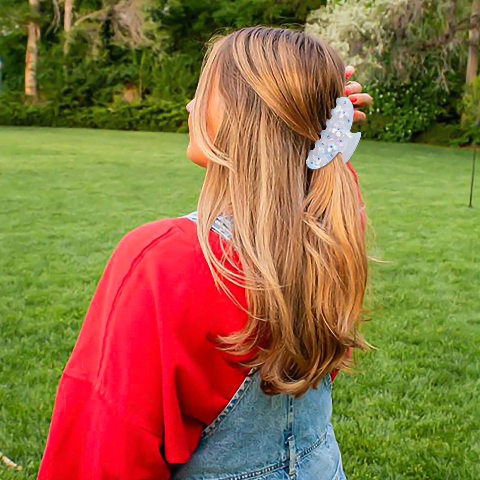 HAIMEIKANG large hair clip in hair demonstrates secure hold on thick or thin styles.