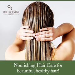 Hair Chemist Coconut Oil Deep Repair Masque jar closeup emphasizes rich, nourishing formula.