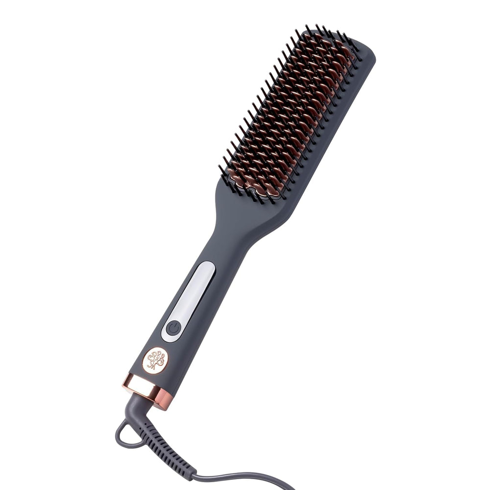 Hairitage heated ceramic straightening brush close-up with even heat for smoother, frizz-controlled styling.