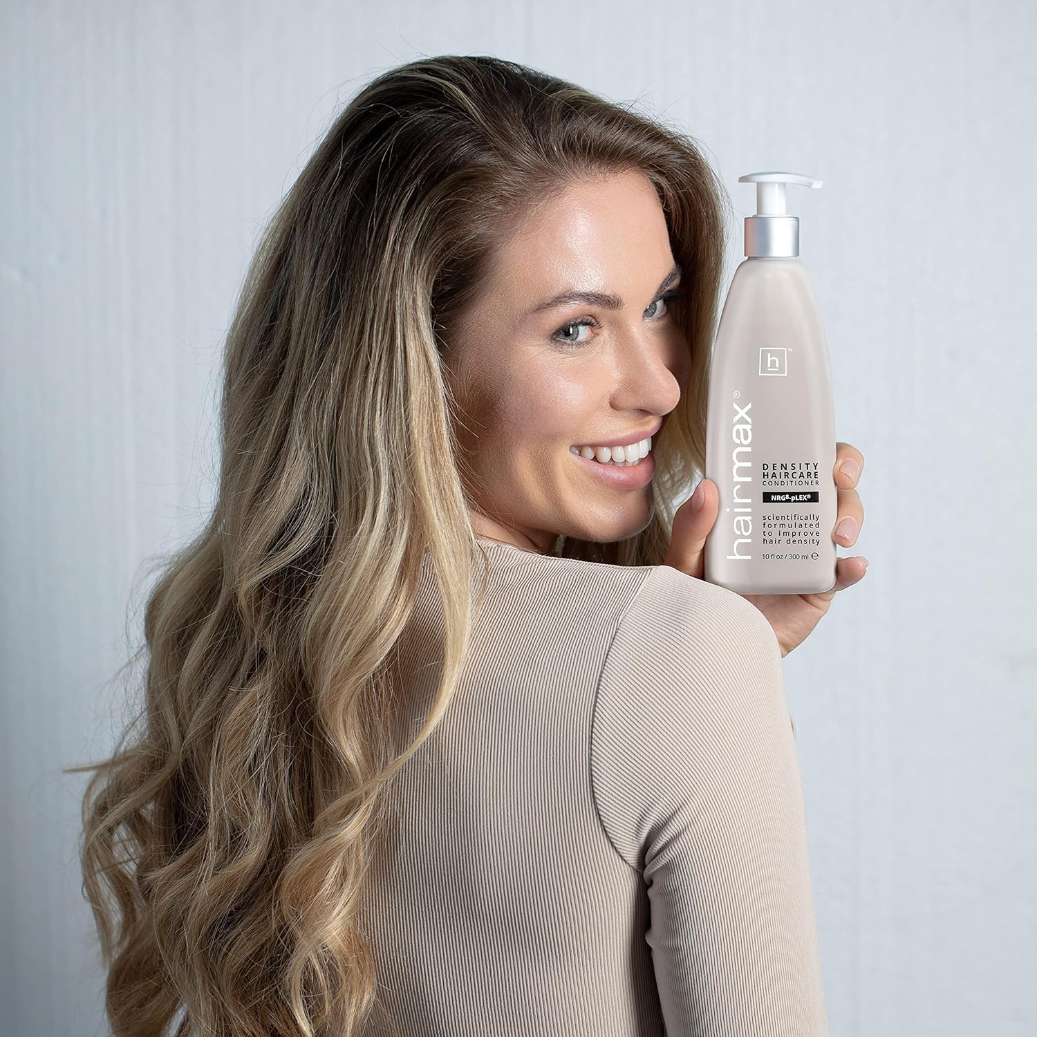 Hairmax scalp care routine with shampoo and conditioner for hair wellness.