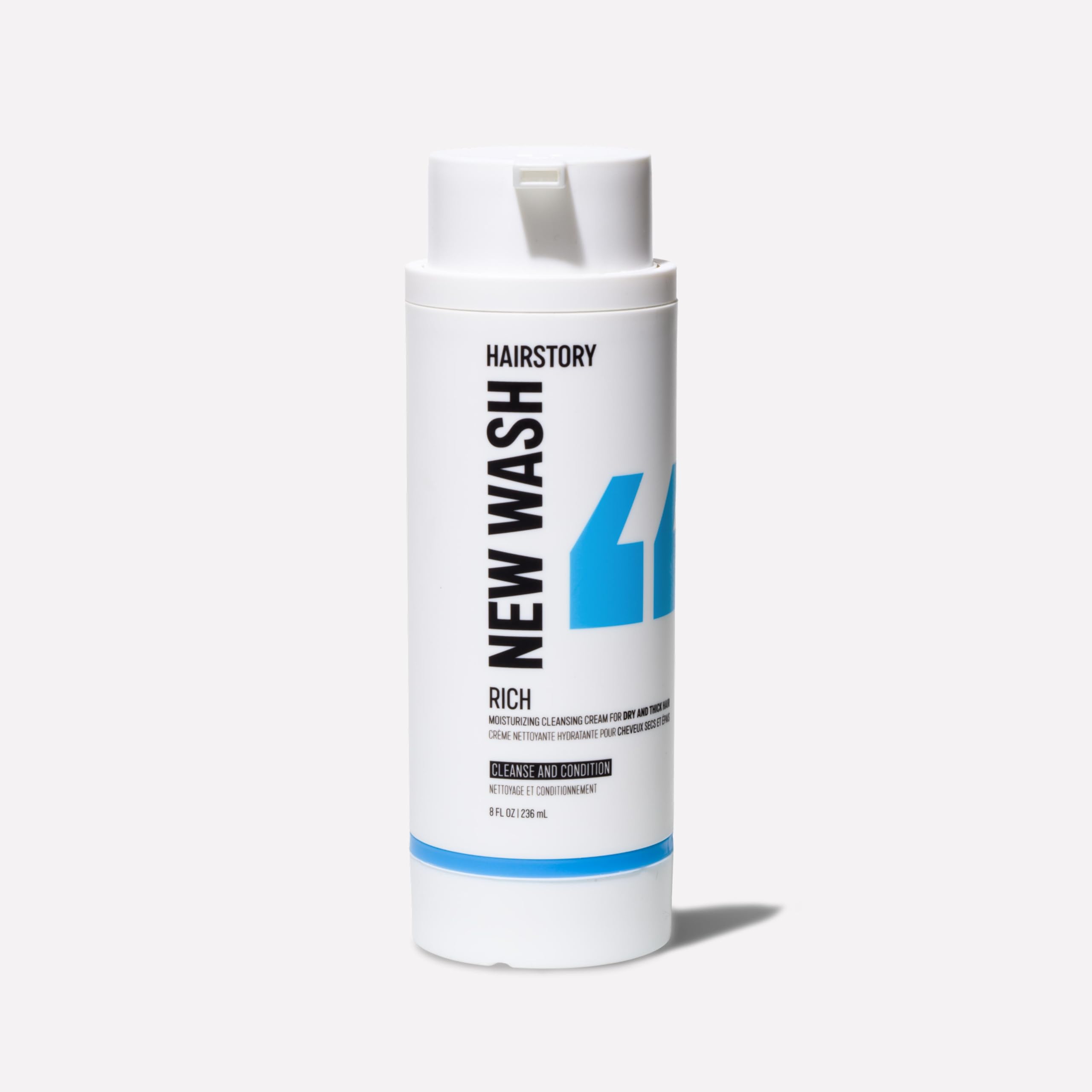 Hairstory New Wash Rich bottle front shows clean design and color-friendly cleansing.