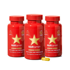 HAIRtamin Advanced Formula bottle front shows daily hair support benefits.