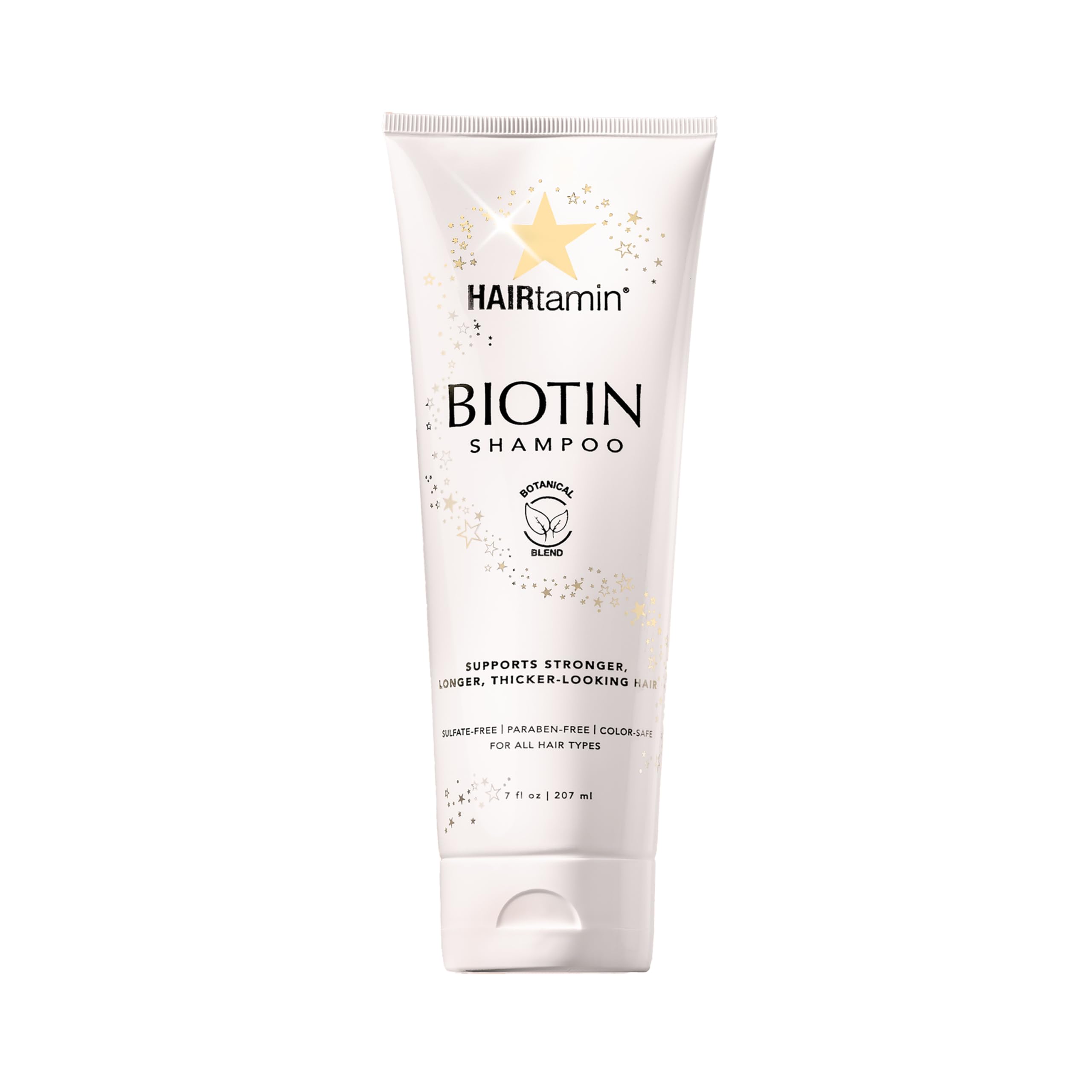 HAIRtamin Biotin Shampoo bottle lifestyle shot highlights volumized, fuller-looking hair.