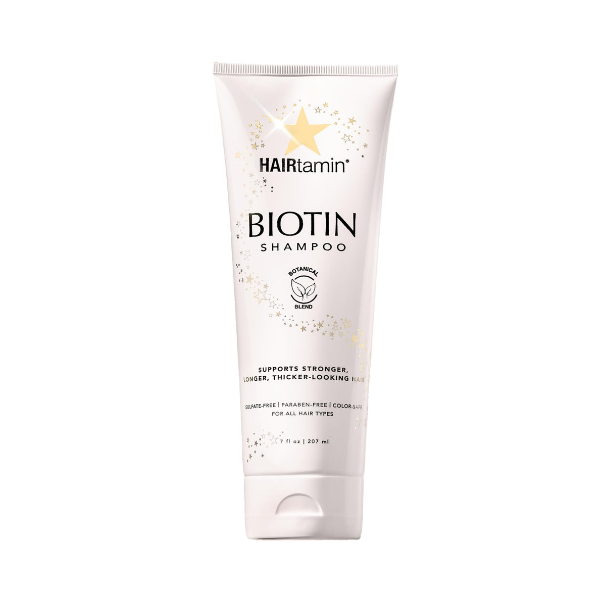 HAIRtamin Biotin Shampoo bottle lifestyle shot highlights volumized, fuller-looking hair.