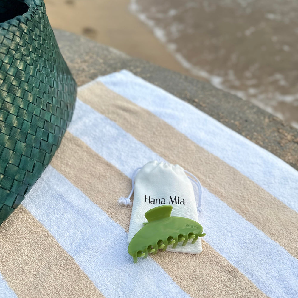 Hana Mia emerald clip for elegant updos with gentle hold