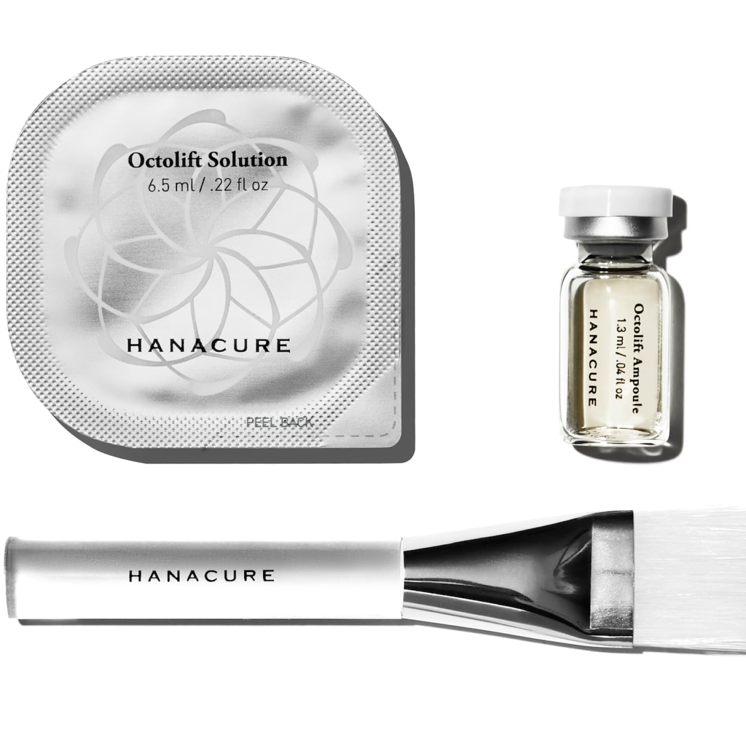 Hanacure All-In-One Facial Starter packaging with serum and brush enabling easy at-home treatment.
