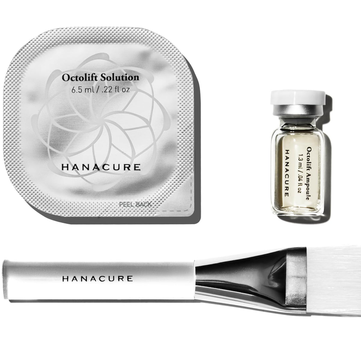 Hanacure All-In-One Facial Starter packaging with serum and brush enabling easy at-home treatment.