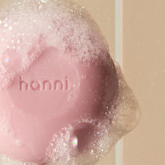 HANNI Cocoon Cleanse serum in-shower application image shows easy cleansing and hydration