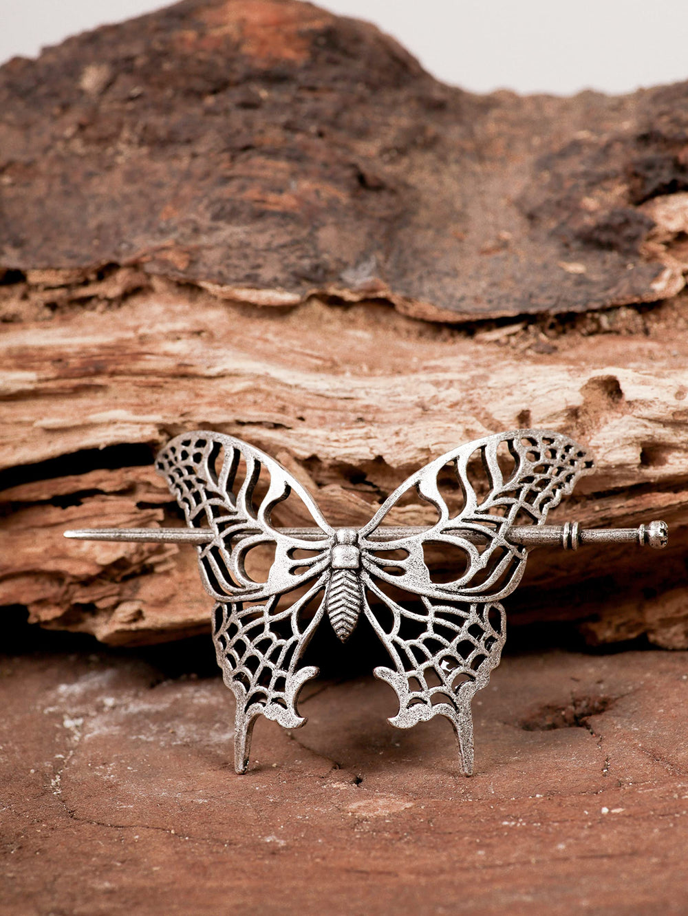 HAQUIL butterfly hairpin styled in an elegant updo