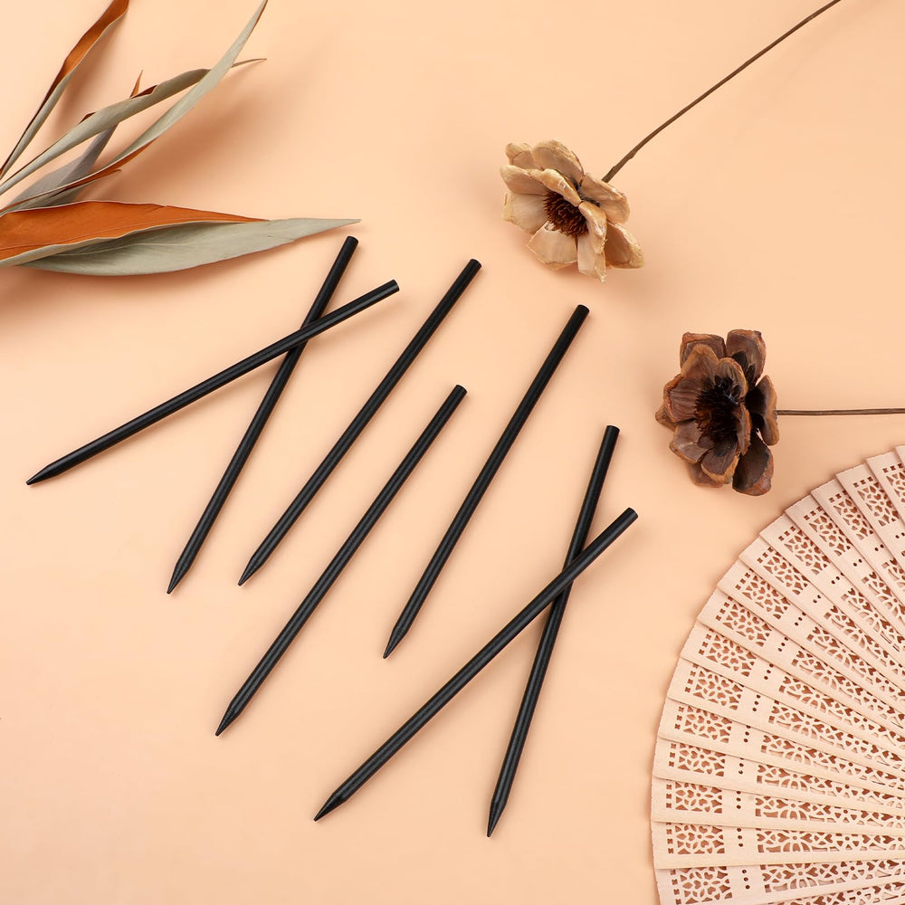 Hariendny hole-top sticks providing grip for textured braids and buns.