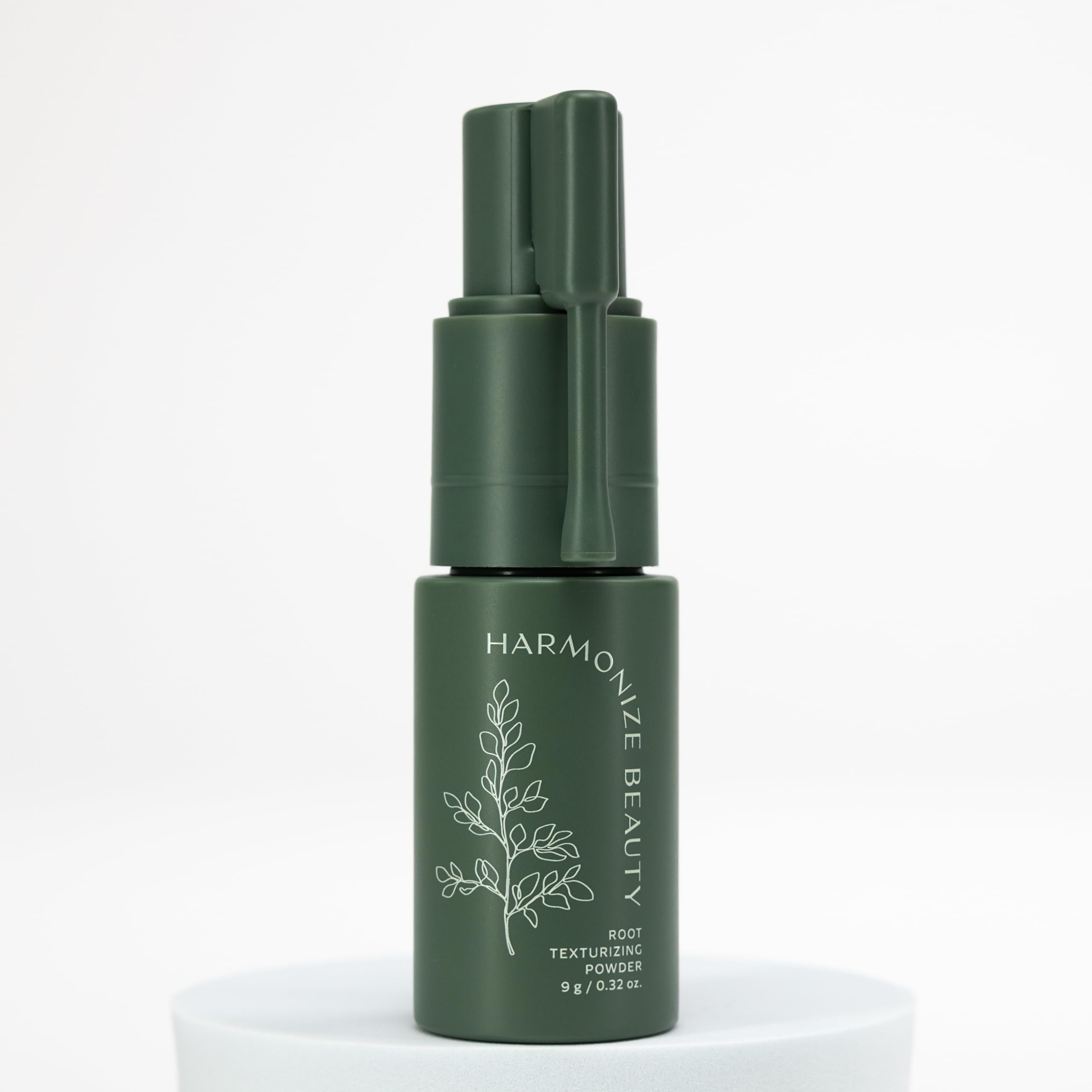 Harmonize Beauty Root Texture Powder closeup reveals talc-free formula and fine texture.