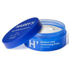 Harry's Texturizing Putty bottle closeup shows flexible hold for versatile styling throughout the day.