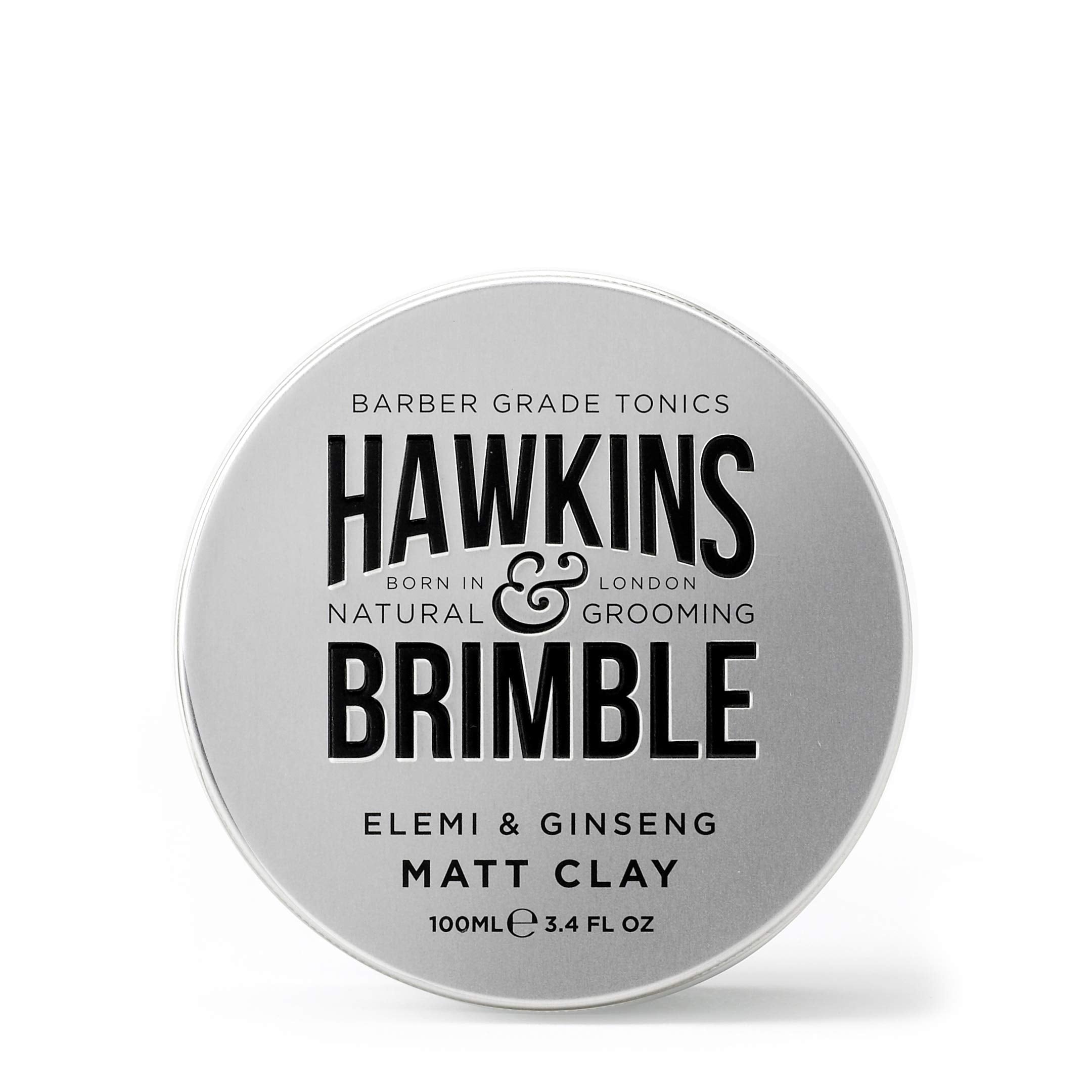 Hawkins & Brimble Matt Clay applied to dry hair for defined look.