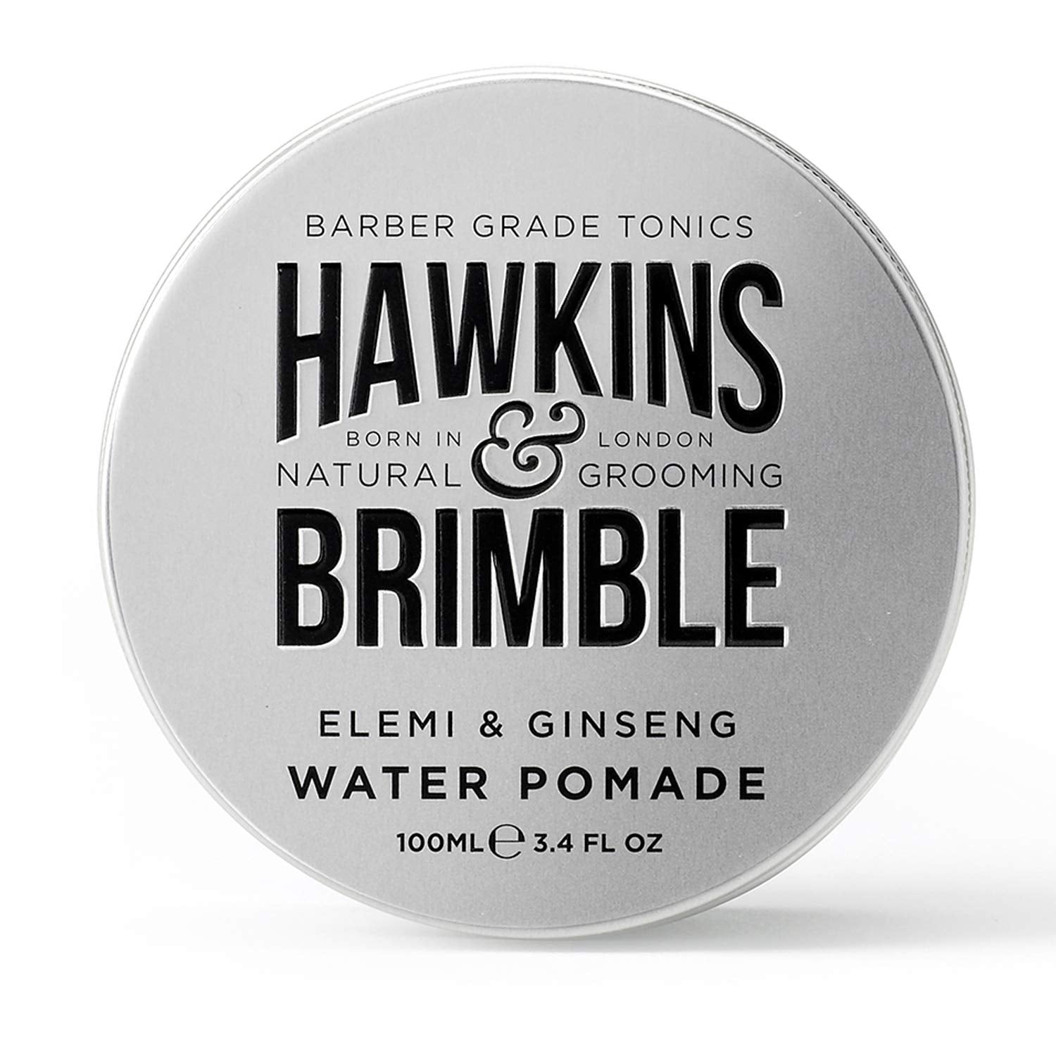 Hawkins & Brimble strong hold pomade bottle closeup demonstrates easy wash and natural shine.