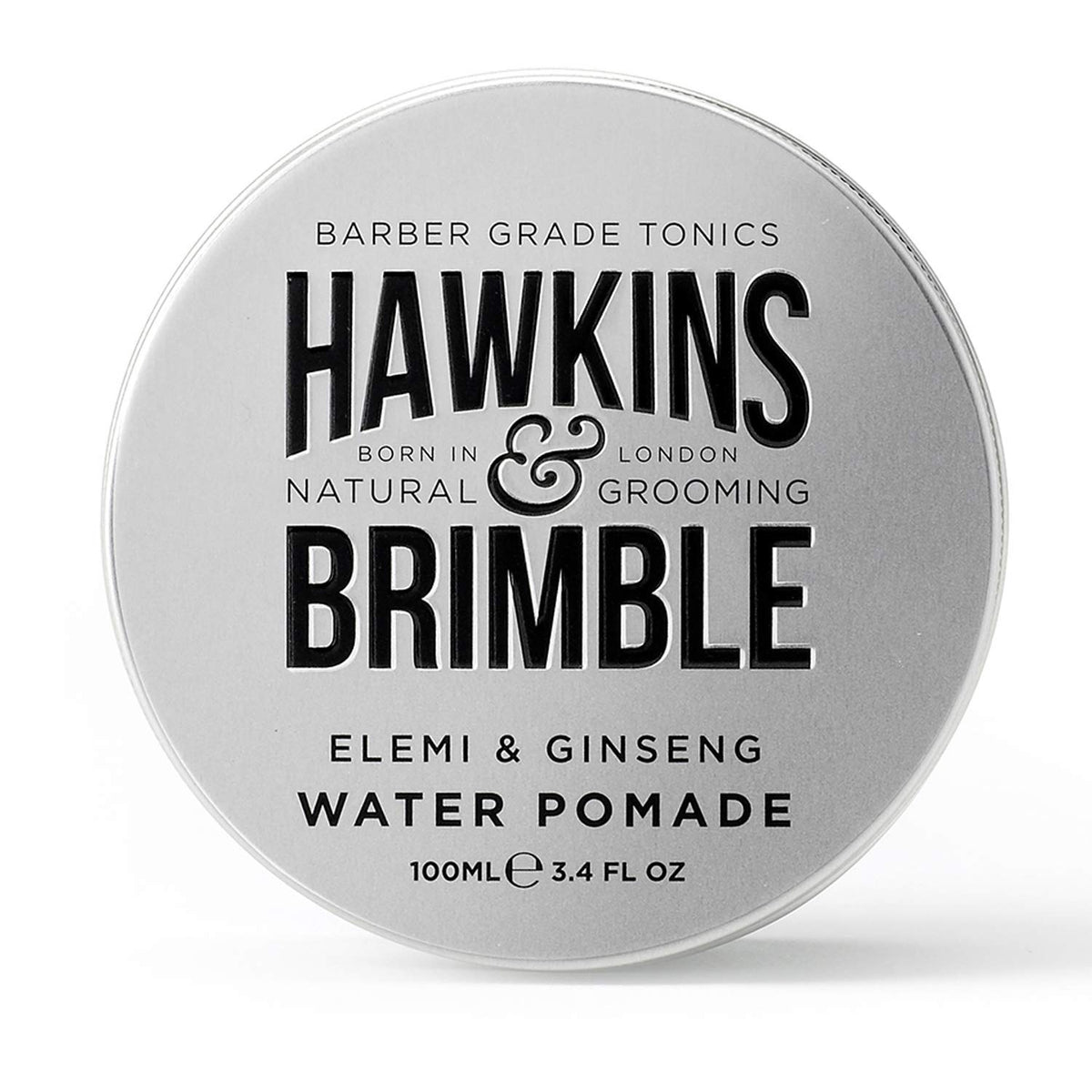 Hawkins & Brimble strong hold pomade bottle closeup demonstrates easy wash and natural shine.