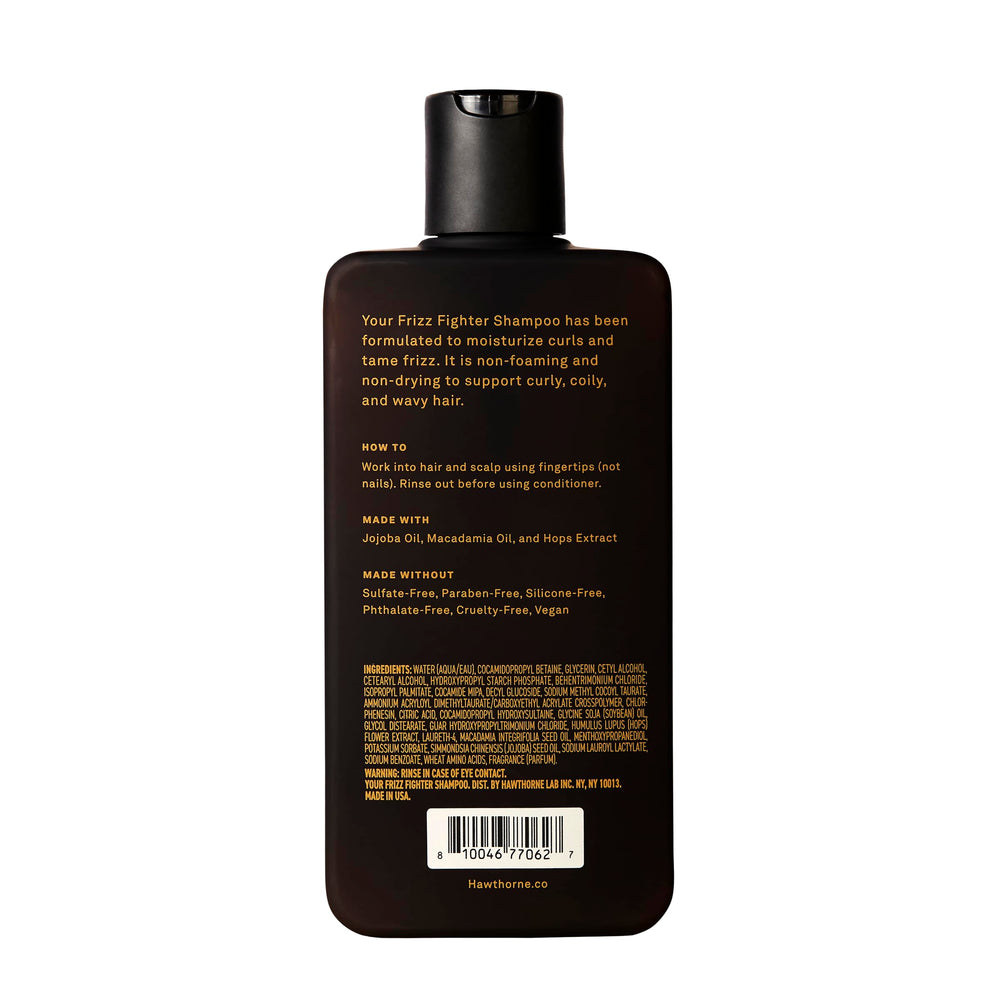 Hawthorne Frizz Fighter Shampoo in a men's grooming setup for frizz control.
