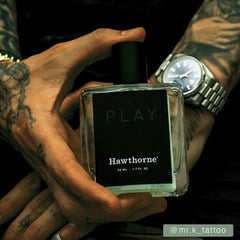 Hawthorne Leather Cologne cap close-up signaling premium packaging and luxury mood.