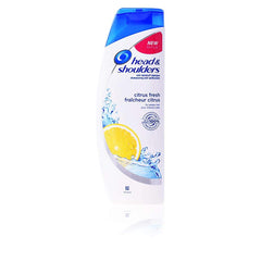Head & Shoulders Citrus Fresh shampoo bottle pour for refreshing scalp care and dandruff relief.