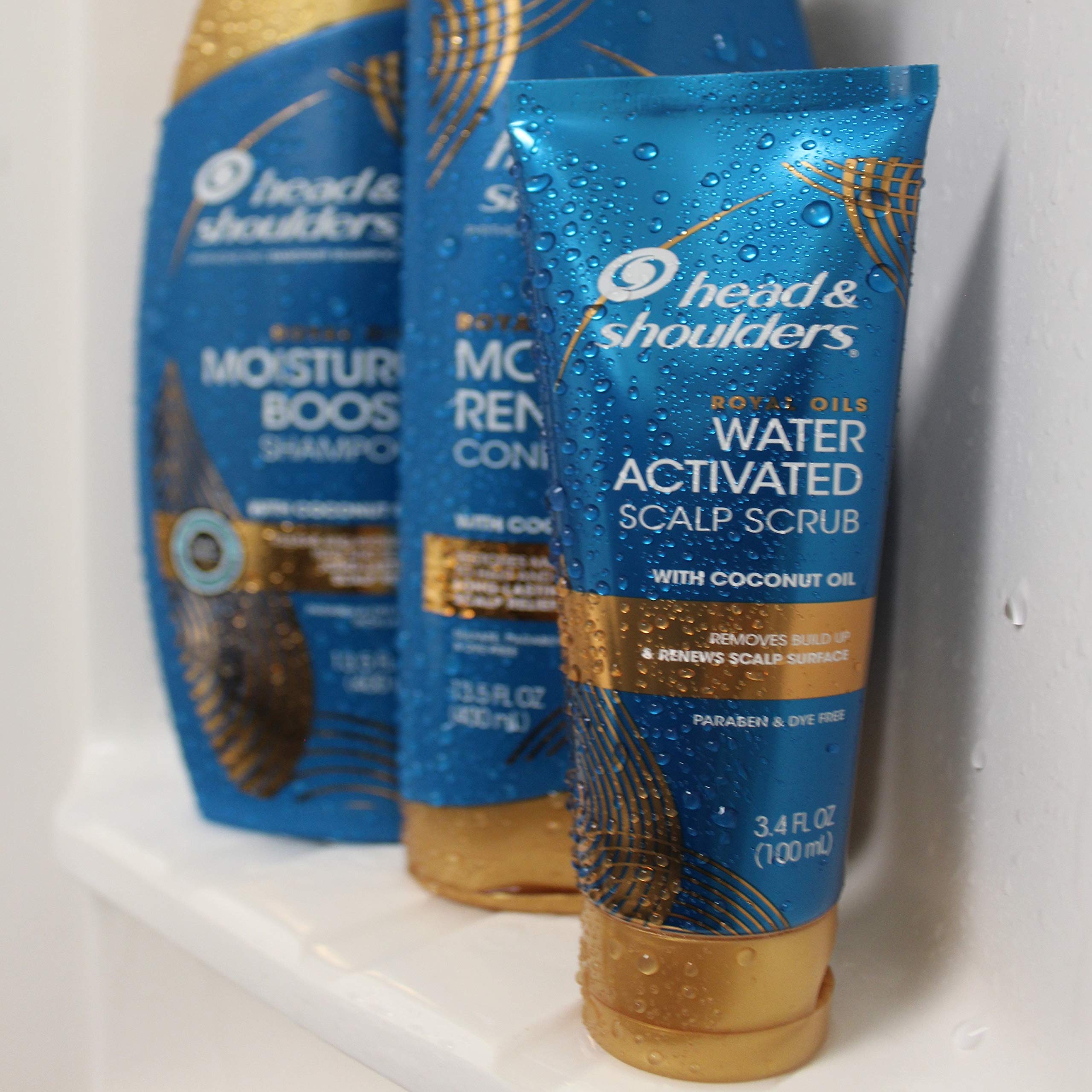 Head & Shoulders Royal Oils scalp scrub massaged onto the scalp for exfoliation