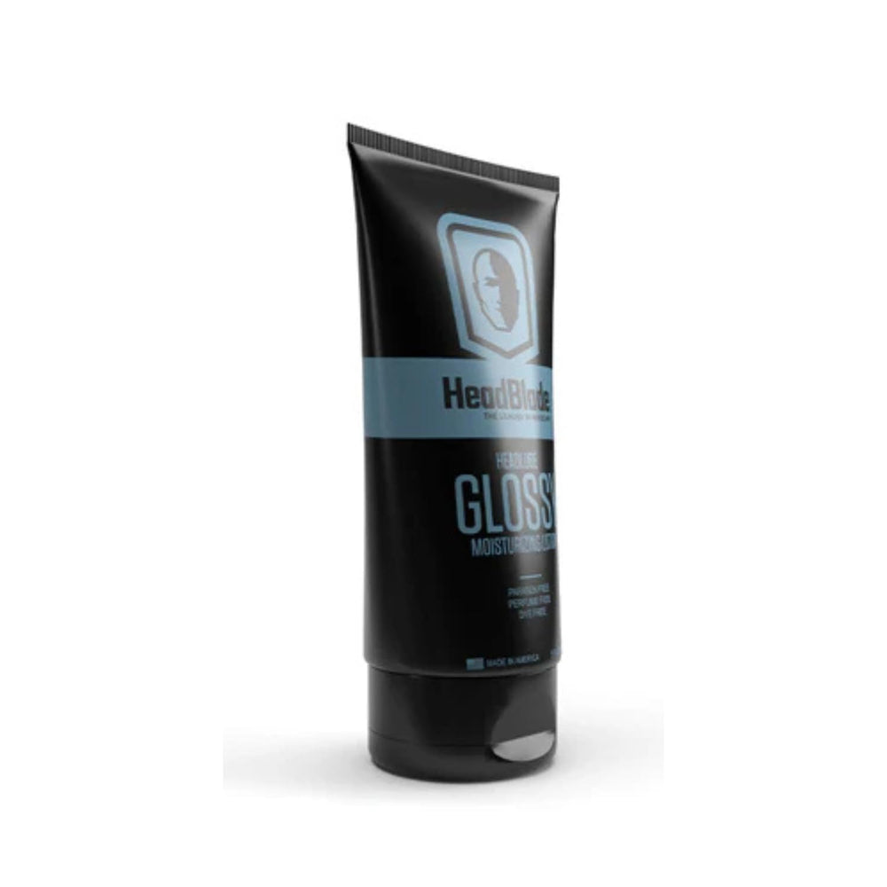 HeadBlade HeadLube Glossy applied to scalp for moisture and shine.