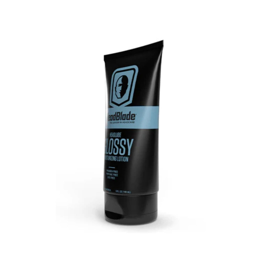 HeadBlade HeadLube Glossy label highlights tea tree oil for refreshing scent.
