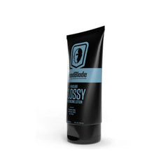 HeadBlade HeadLube Glossy label highlights tea tree oil for refreshing scent.