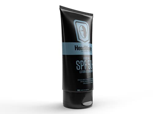 HeadLube SPF 50 being rubbed on skin demonstrates smooth, quick-absorbing protection.