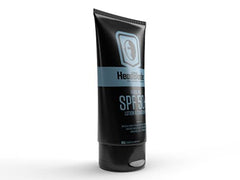 HeadLube SPF 50 being rubbed on skin demonstrates smooth, quick-absorbing protection.