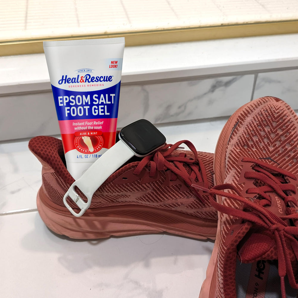 Heal&Rescue foot gel being massaged onto clean feet for relief