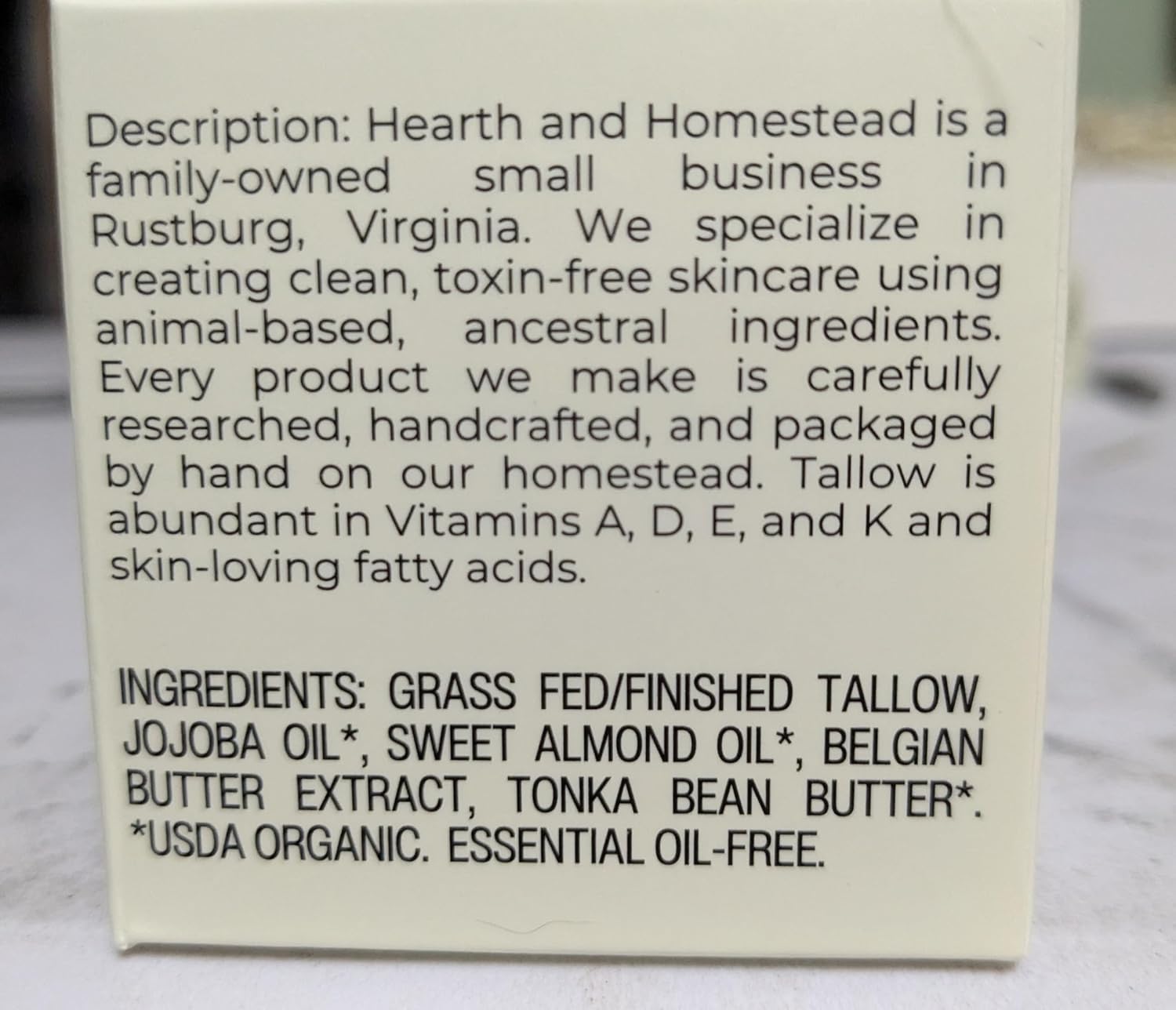 Hearth and Homestead hand applying balm shows convenient daily use for dry skin