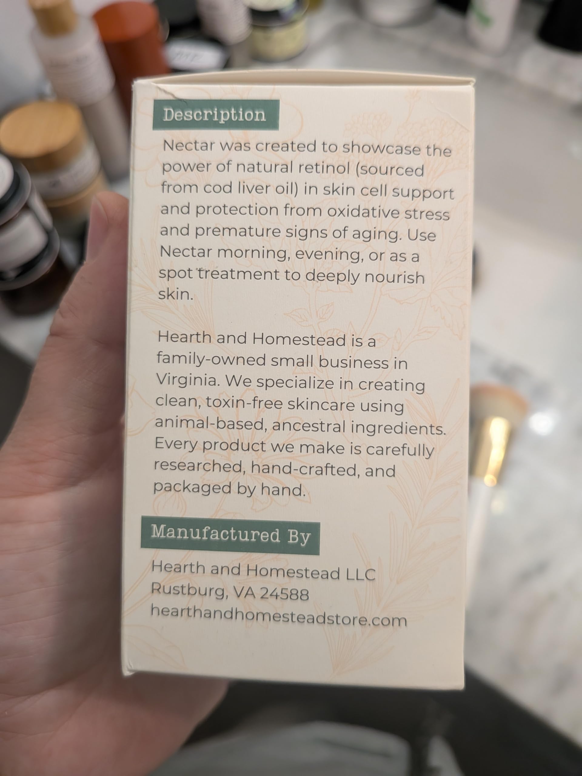 Hearth and Homestead Nectar Serum application rub emphasizes soothing, fragrance-free herbal notes.