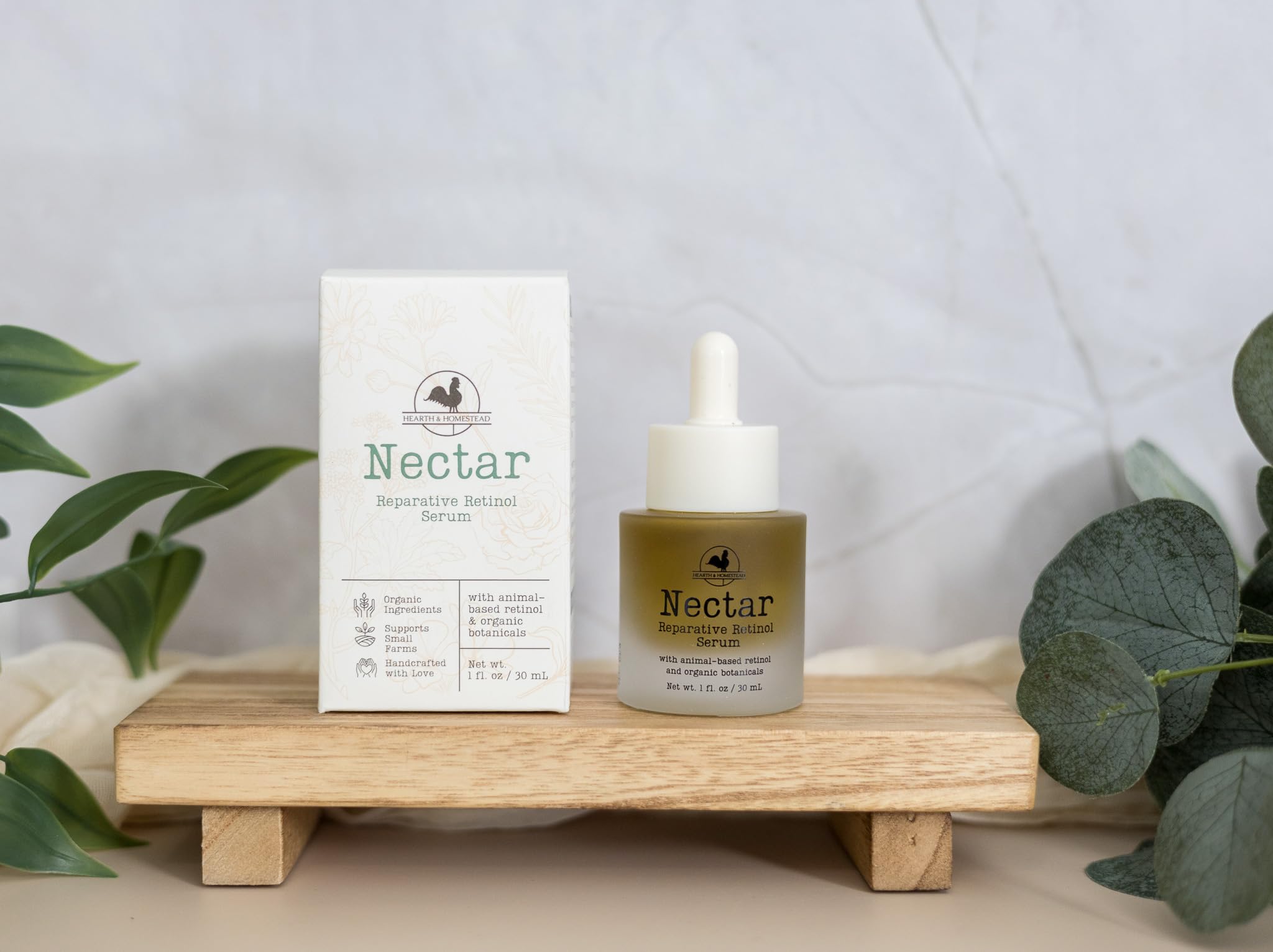 Hearth and Homestead Nectar Serum organic-herbs display highlights yarrow and rose.
