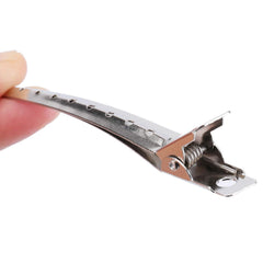 Hedume easy-open spring clip for quick clipping in styling sessions.