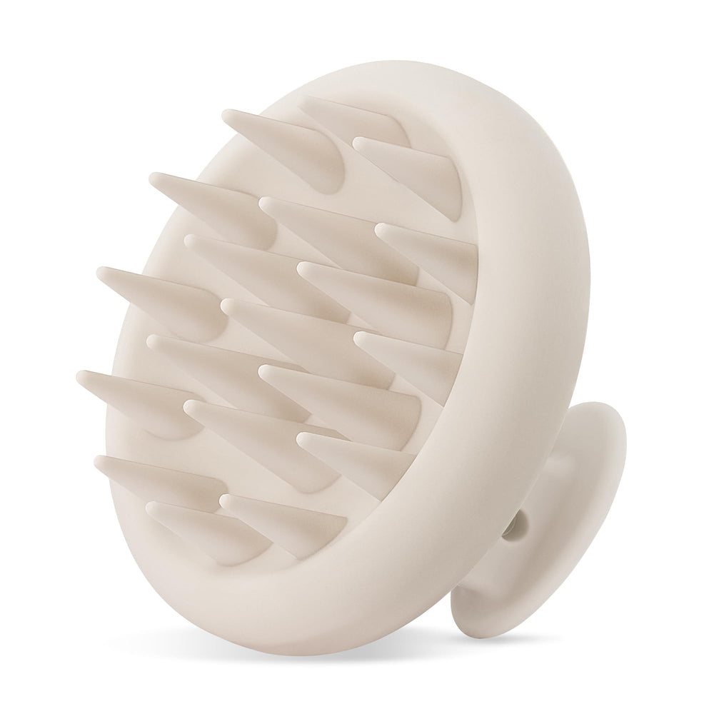 HEETA scalp massager with soft bristles provides a gentle scalp massage during shampoo