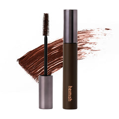 HEIMISH Dailism mascara bottle close-up showing soft brown tint for everyday wear.